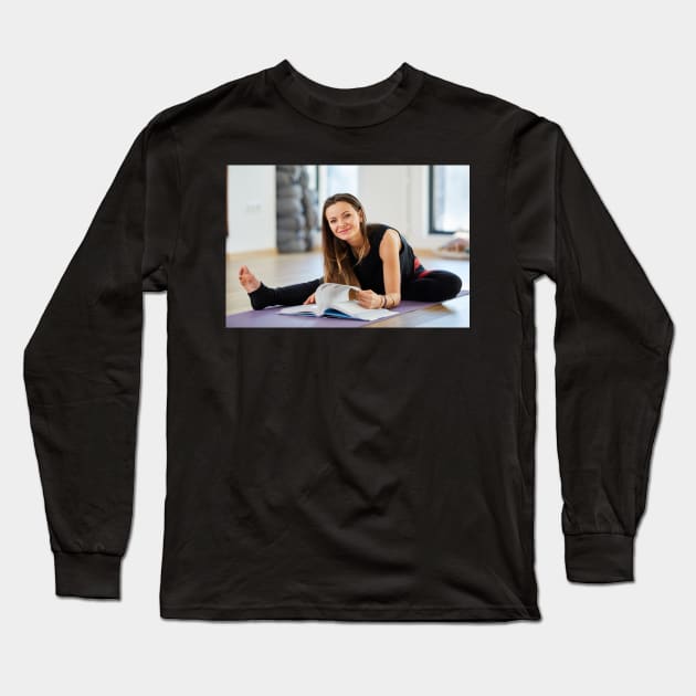 Young woman reading a yoga book Long Sleeve T-Shirt by naturalis